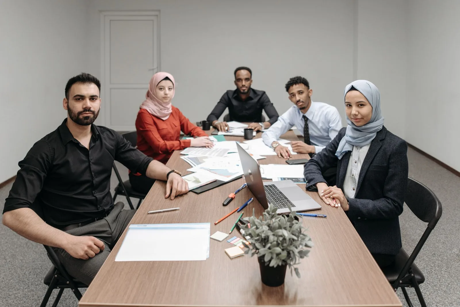 Multilingual business team collaborating on a marketing plan